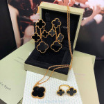 Кольцо Van Cleef 2 мотива черное в желтом