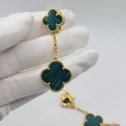 Серьги Van Cleef 2 мотива зеленые в желтом