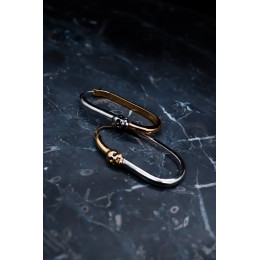 Серьги Alexander McQueen с черепами