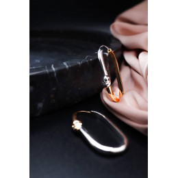 Серьги Alexander McQueen с черепами