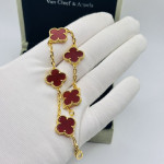 Комплект Van Cleef красный в желтом (серьги, браслет)