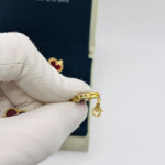 Комплект Van Cleef красный в желтом (серьги, браслет)