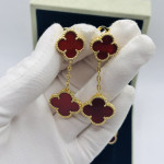 Комплект Van Cleef красный в желтом (серьги, браслет)