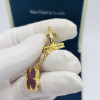 Комплект Van Cleef красный в желтом (серьги, браслет)