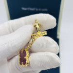 Комплект Van Cleef красный в желтом (серьги, браслет)