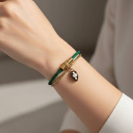Браслет Bvlgari Serpenti желтый металл с зеленым