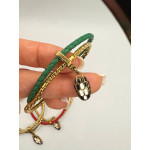 Браслет Bvlgari Serpenti желтый металл с зеленым